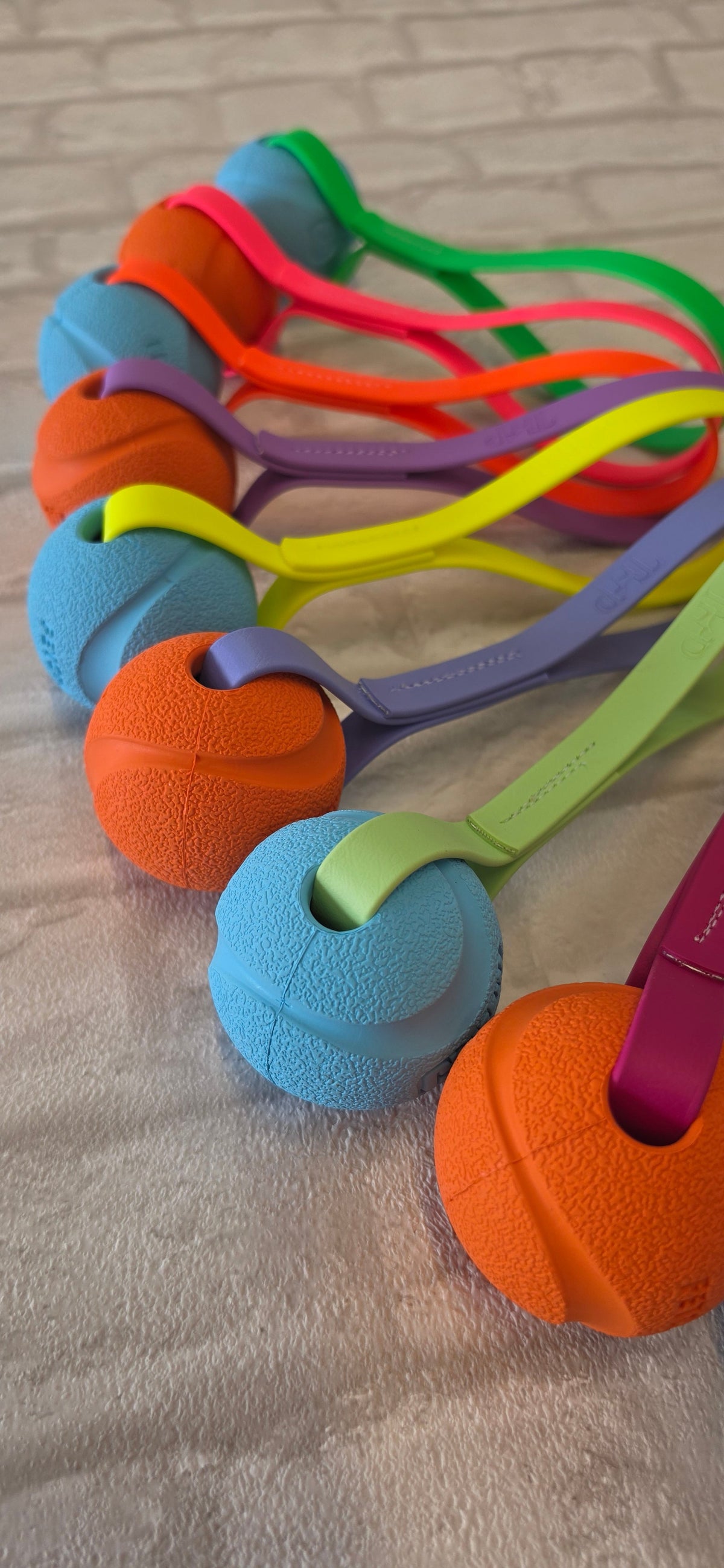 Chuck-It® Ball on Waterproof BioThane® Tug & Launcher Toy