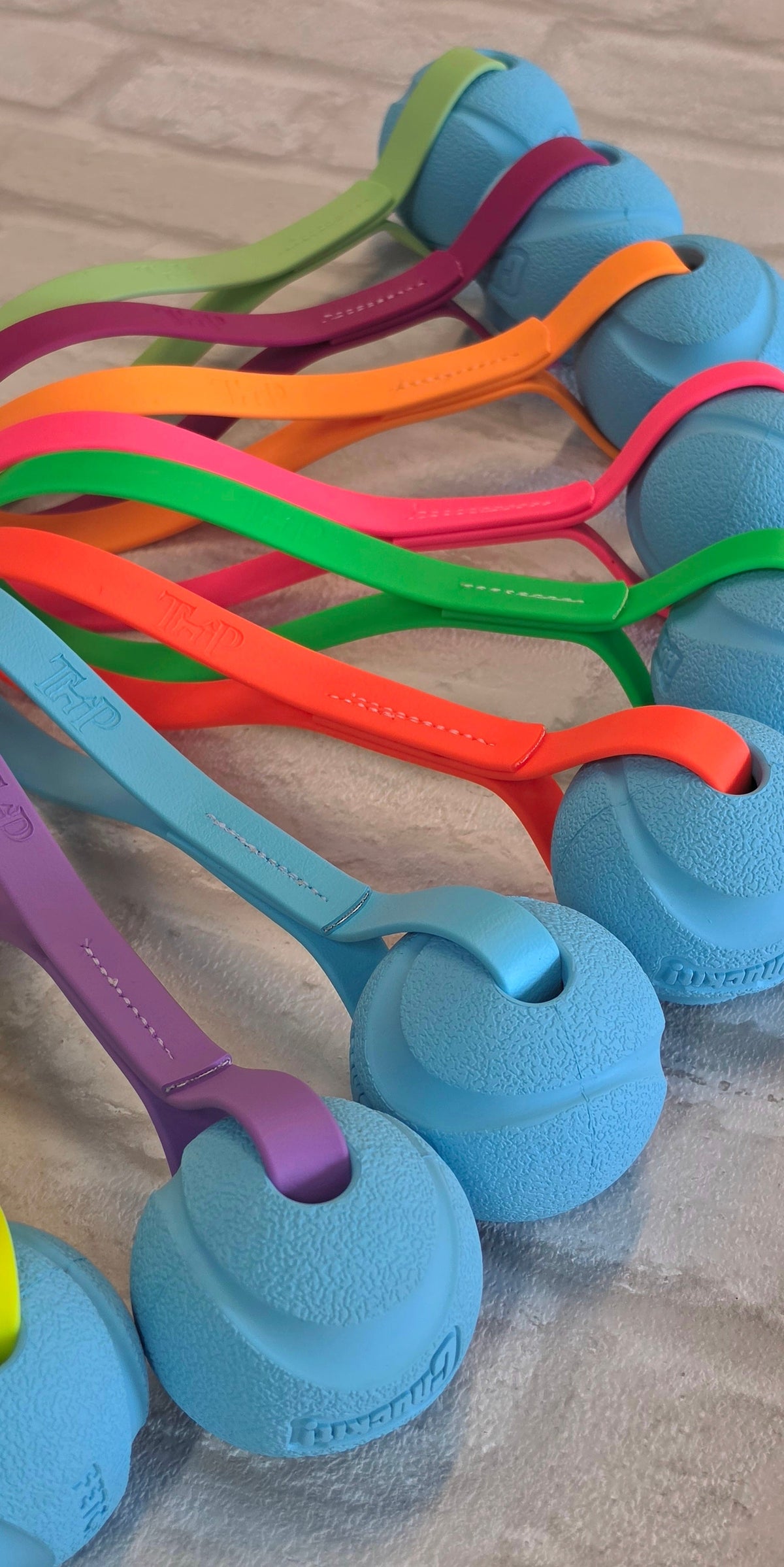 Chuck-It® Ball on Waterproof BioThane® Tug & Launcher Toy