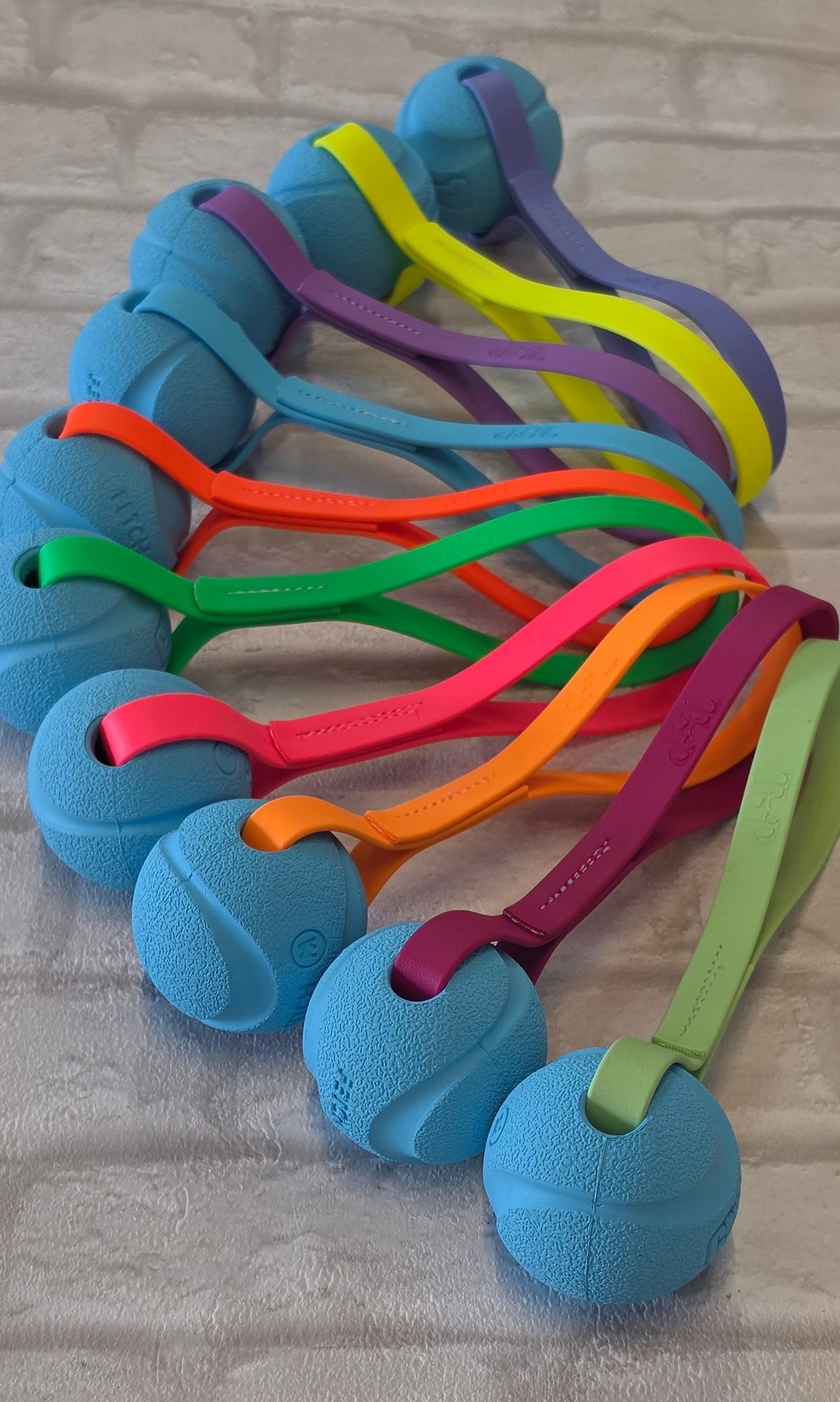 Chuck-It® Ball on Waterproof BioThane® Tug & Launcher Toy
