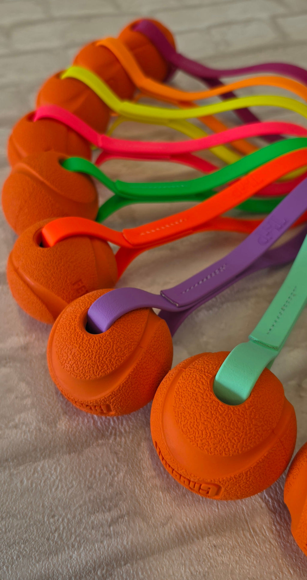 Chuck-It® Ball on Waterproof BioThane® Tug & Launcher Toy